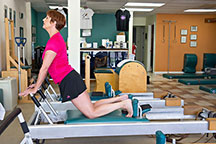 pilates austin Down Stretch technique on the reformer