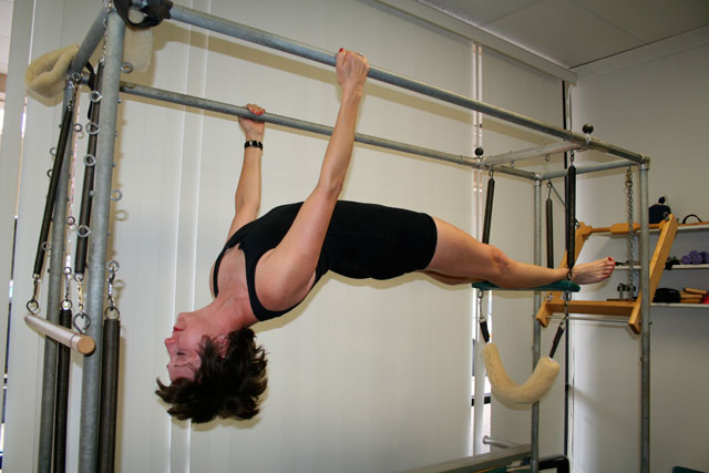 Pilates hanging pullups technique